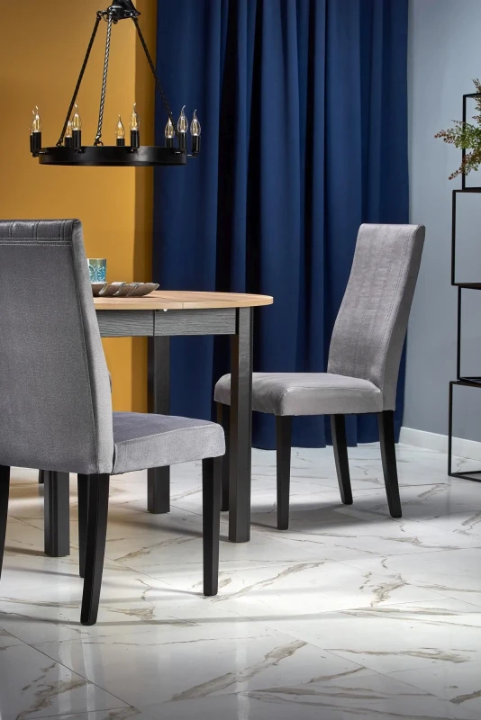 Stół rozkładany Ringo 102-142 cm okrągły do jadalni dąb artisan/czarny