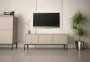 Szafka RTV Aspen I 150 cm trzydrzwiowa na metalowych nóżkach do salonu cashmere/czarny
