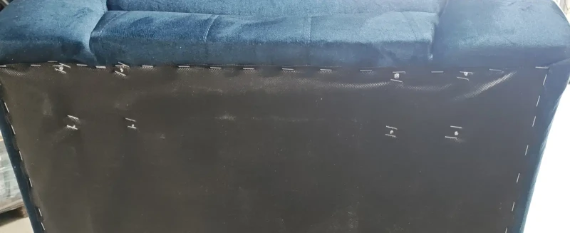 Fotel tapicerowany Delicante w stylu skandynawskim Monolith 77