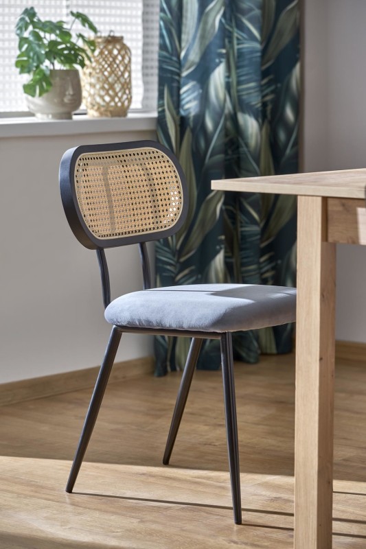 Krzesło tapicerowane K503 z rattanowym oparciem do jadalni ciemny zielony