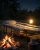 freepik__ko-kempingowe-ustawione-przy-ognisku-otoczone-ciep__52896.webp