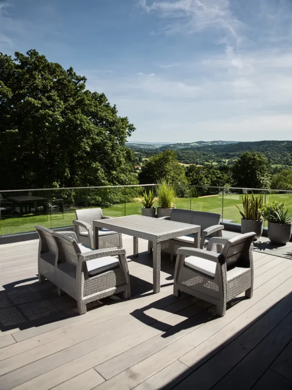 Zestaw mebli ogrodowych 6-osobowy 2 sofy 2 fotele stół szary z poduszkami