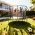 Trampolina ogrodowa 305 cm z siatką wewnętrzną i drabinką czarno-zielona
