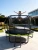 Trampolina ogrodowa 244 cm z siatką wewnętrzną i drabinką czarno-zielona