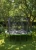 Trampolina ogrodowa 244 cm z siatką wewnętrzną i drabinką czarno-zielona