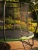 Trampolina ogrodowa 244 cm z siatką wewnętrzną i drabinką czarno-zielona
