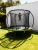 Trampolina ogrodowa 244 cm z siatką wewnętrzną i drabinką czarno-zielona