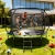 Trampolina ogrodowa 244 cm z siatką wewnętrzną i drabinką czarno-zielona